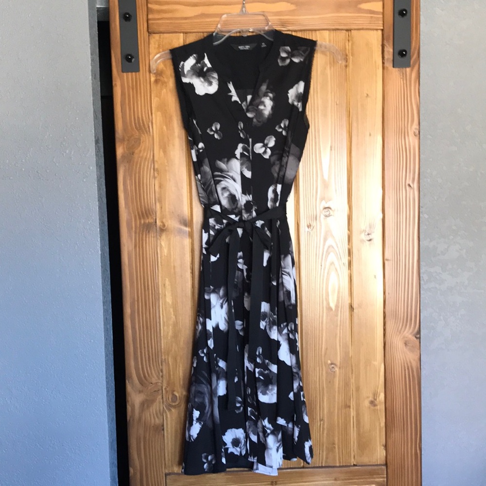 Woman’s black and white floral dress